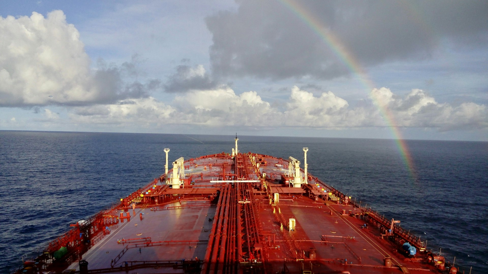 A large cargo ship in the middle of the ocean